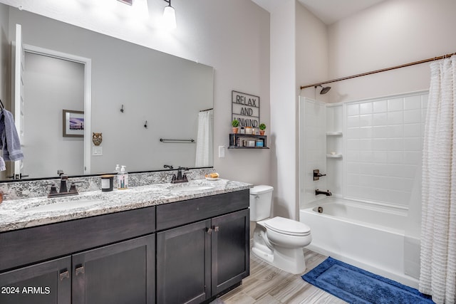 full bathroom featuring shower / bath combination with curtain, wood-type flooring, vanity, and toilet