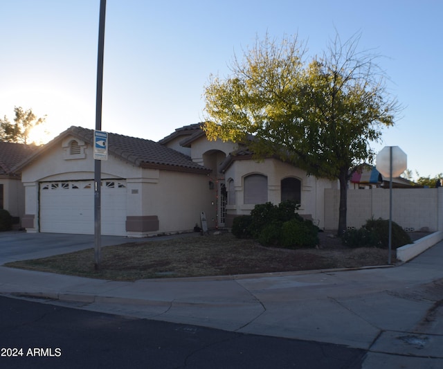 view of front of house with a garage