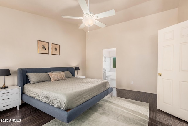 bedroom with ensuite bathroom, ceiling fan, and wood finished floors