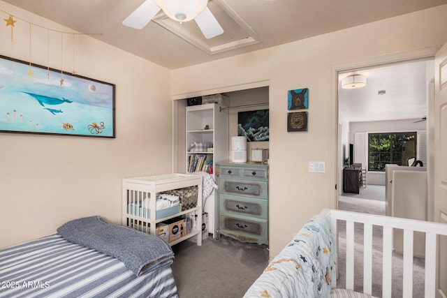 bedroom with a closet, carpet flooring, and a ceiling fan