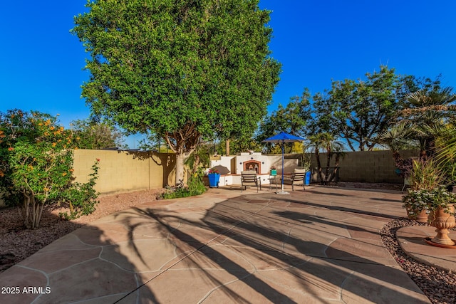view of patio with a fenced backyard