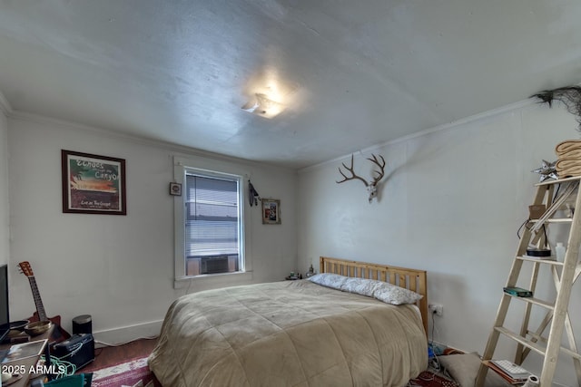 514 Brophy Ave, Bisbee, AZ 85603 - bedroom with crown molding, wood finished floors, and baseboards