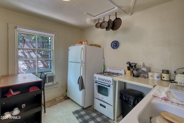 514 Brophy Ave, Bisbee, AZ 85603 - kitchen with white appliances and light countertops