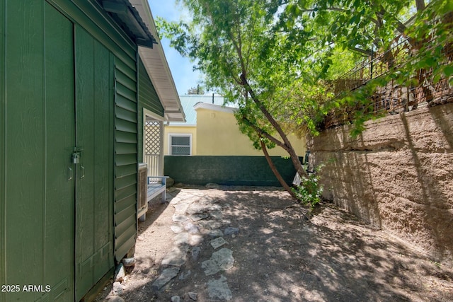 514 Brophy Ave, Bisbee, AZ 85603 - view of side of home featuring fence and a patio area