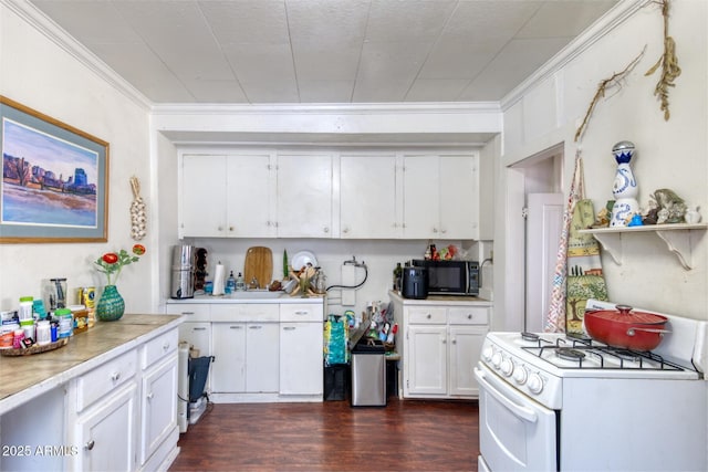514 Brophy Ave, Bisbee, AZ 85603 - kitchen featuring white gas range oven, crown molding, white cabinets, light countertops, and black microwave