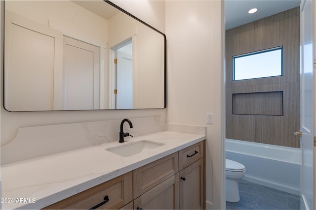 full bathroom featuring shower / bathing tub combination, vanity, and toilet