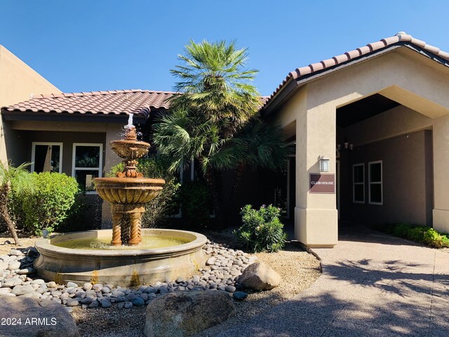 view of pool with a patio area and a hot tub