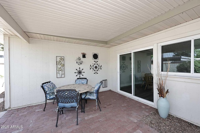 view of patio featuring outdoor dining area