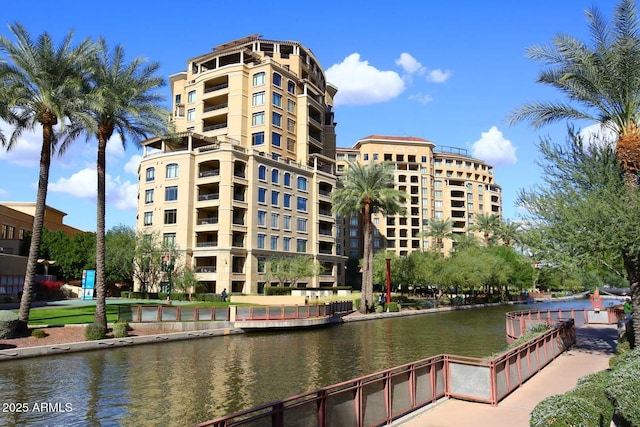 view of building exterior with a water view