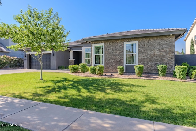3145 E Boot Track Trl, Gilbert, AZ 85296 - view of front of house with a garage, concrete driveway, and a front yard
