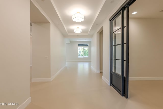 3145 E Boot Track Trl, Gilbert, AZ 85296 - corridor with a raised ceiling and baseboards
