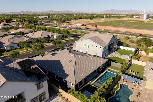 birds eye view of property featuring a residential view and a mountain view