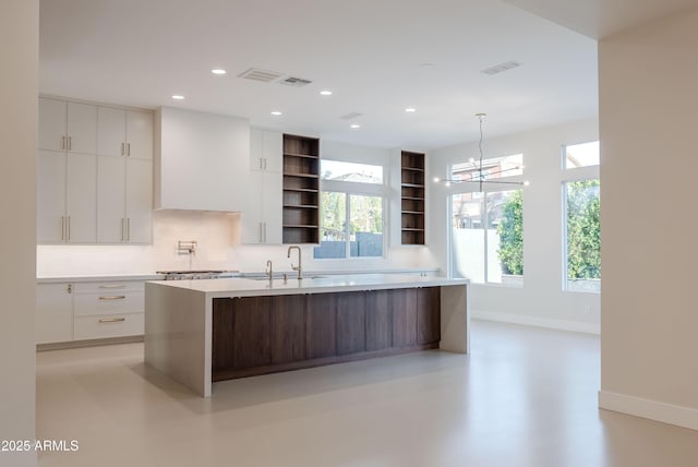 kitchen featuring white cabinetry, open shelves, and modern cabinets