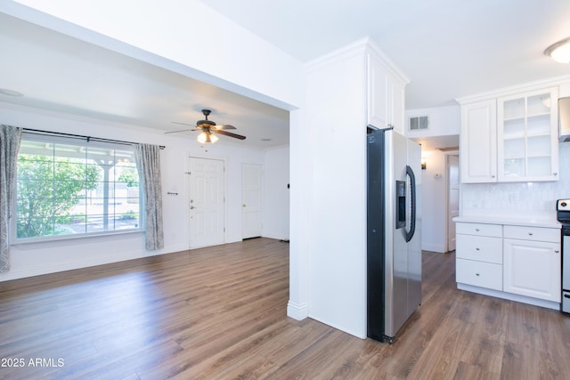 1006 S Una Ave, Tempe, AZ 85281 - kitchen featuring stainless steel fridge with ice dispenser, dark wood finished floors, white cabinets, and glass insert cabinets