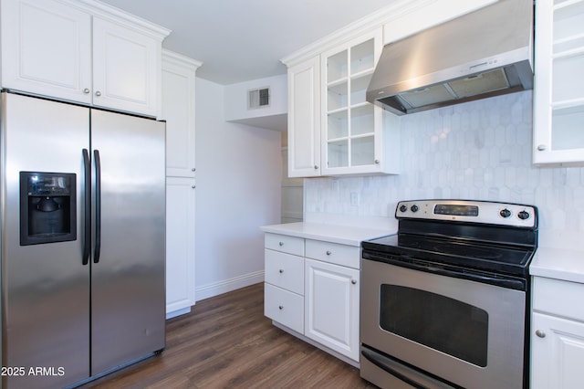 1006 S Una Ave, Tempe, AZ 85281 - kitchen featuring stainless steel appliances, wall chimney range hood, decorative backsplash, and white cabinets