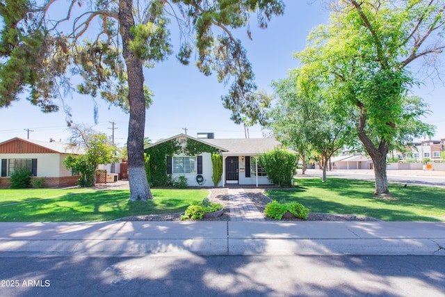 1006 S Una Ave, Tempe, AZ 85281 - ranch-style house with a front lawn