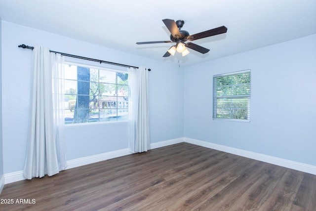 1006 S Una Ave, Tempe, AZ 85281 - spare room with dark wood-style floors and ceiling fan