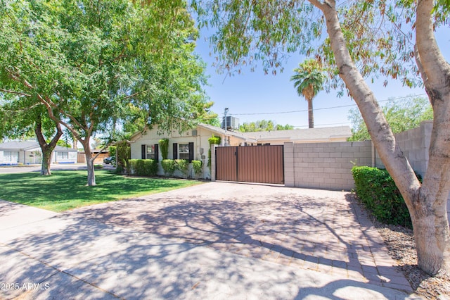 1006 S Una Ave, Tempe, AZ 85281 - ranch-style house with a gate and driveway