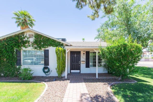 1006 S Una Ave, Tempe, AZ 85281 - ranch-style home with a front yard and a porch