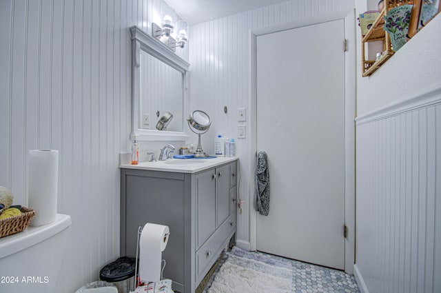 bathroom with toilet and vanity