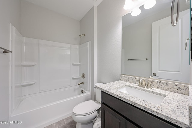 full bath featuring wood finished floors, toilet, shower / bathing tub combination, and vanity