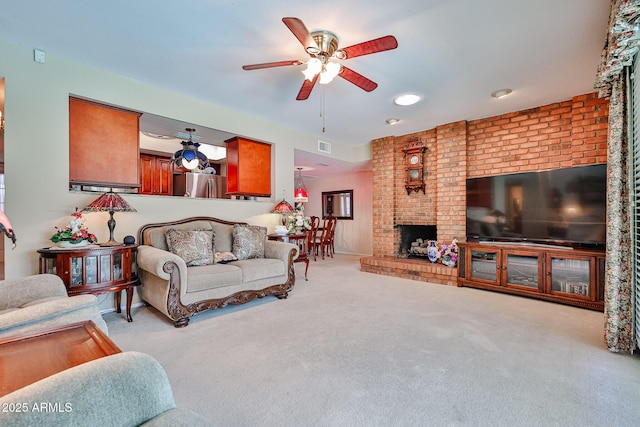 5349 W Acapulco Ln, Glendale, AZ 85306 - living area featuring ceiling fan, carpet flooring, brick wall, and a brick fireplace
