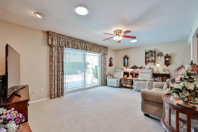 5349 W Acapulco Ln, Glendale, AZ 85306 - carpeted living room with ceiling fan