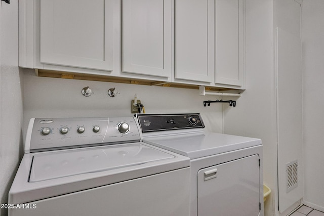 5349 W Acapulco Ln, Glendale, AZ 85306 - laundry area featuring washer and dryer and cabinet space