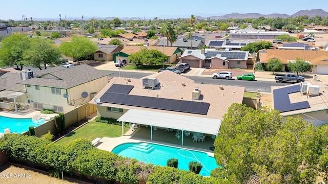 5349 W Acapulco Ln, Glendale, AZ 85306 - aerial view of residential area featuring a pool area and mountains