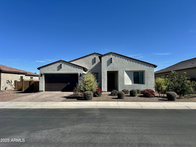 8024 W State Ave, Glendale, AZ 85303 - view of front of home featuring an attached garage, driveway, and stucco siding