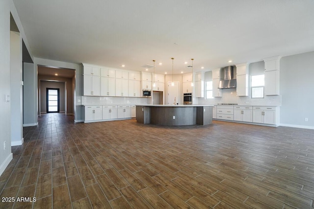 1284 E Coconino Way, Gilbert, AZ 85298 - kitchen featuring appliances with stainless steel finishes, wall chimney exhaust hood, dark wood-style flooring, white cabinets, and a kitchen island