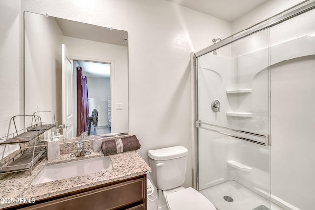 25787 W Allen St, Buckeye, AZ 85326 - full bathroom featuring a stall shower, vanity, and toilet