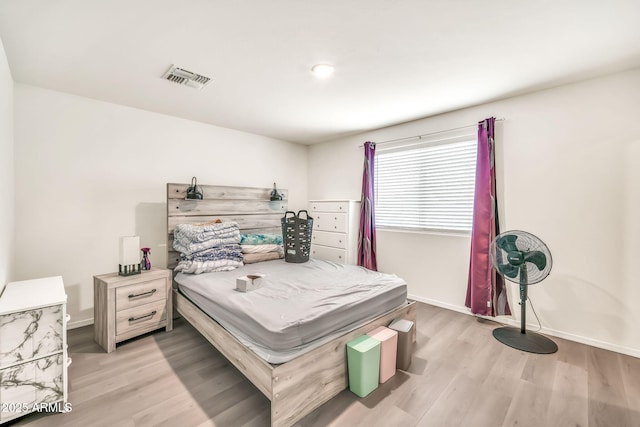 25787 W Allen St, Buckeye, AZ 85326 - bedroom featuring light wood-style floors and baseboards