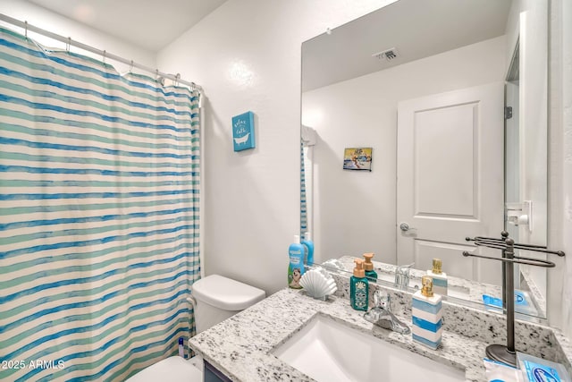 25787 W Allen St, Buckeye, AZ 85326 - bathroom with toilet, vanity, and a shower with curtain