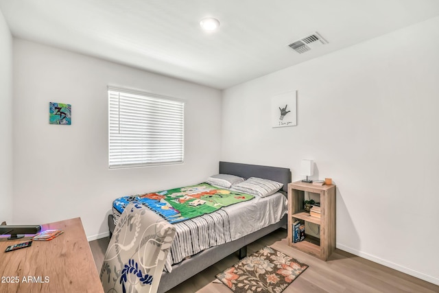 25787 W Allen St, Buckeye, AZ 85326 - bedroom with wood finished floors and baseboards