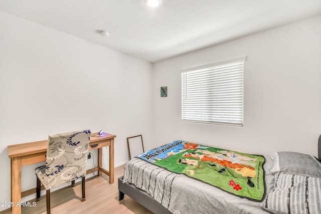 25787 W Allen St, Buckeye, AZ 85326 - bedroom with light wood finished floors and baseboards