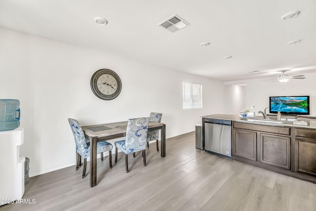 25787 W Allen St, Buckeye, AZ 85326 - dining area with light wood-style floors and ceiling fan