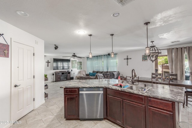 12128 W Range Mule Dr, Peoria, AZ 85383 - kitchen featuring stainless steel dishwasher, a sink, plenty of natural light, open floor plan, and recessed lighting