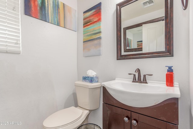 12128 W Range Mule Dr, Peoria, AZ 85383 - half bathroom featuring toilet and vanity