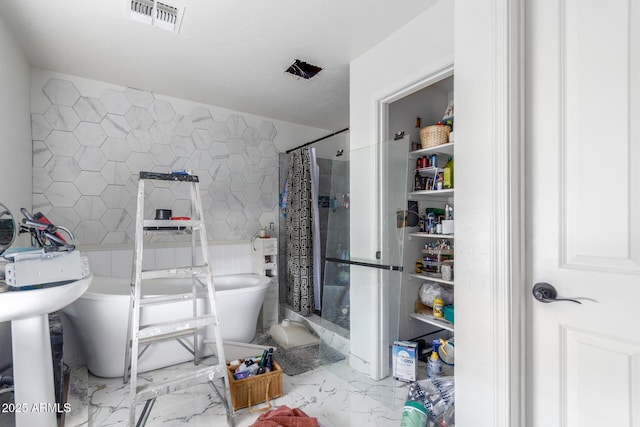 12128 W Range Mule Dr, Peoria, AZ 85383 - full bath with marble finish flooring, tile walls, and a shower with curtain