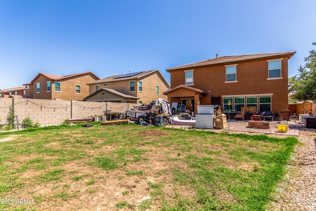 12128 W Range Mule Dr, Peoria, AZ 85383 - back of house with a patio and stucco siding