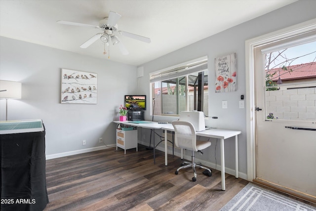 office featuring wood finished floors, baseboards, and ceiling fan