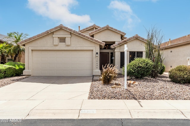 16424 S 46th Way, Phoenix, AZ 85048 - ranch-style home featuring a garage, driveway, stucco siding, and a tile roof