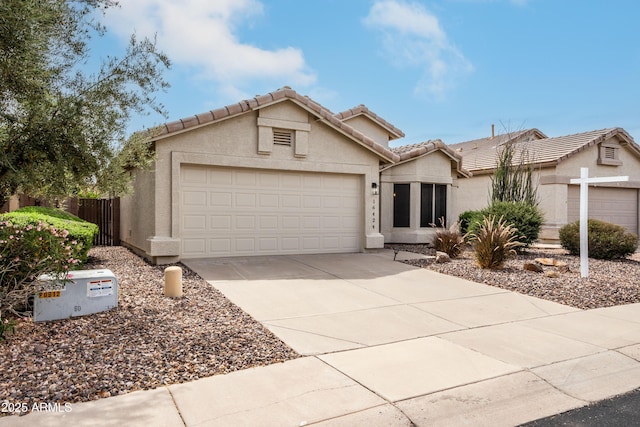 16424 S 46th Way, Phoenix, AZ 85048 - view of front facade featuring stucco siding, a garage, driveway, and a tiled roof