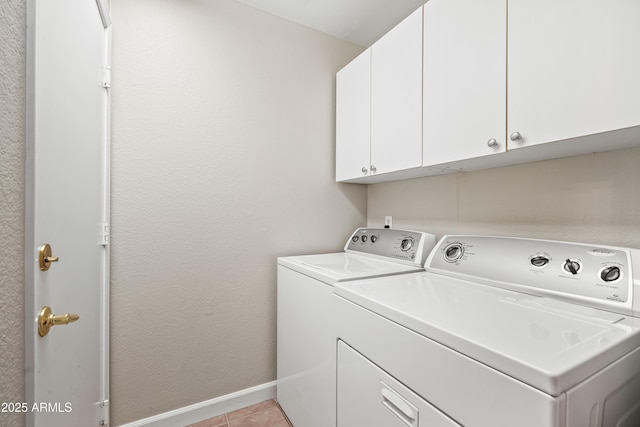16424 S 46th Way, Phoenix, AZ 85048 - washroom with separate washer and dryer, cabinet space, baseboards, and light tile patterned floors