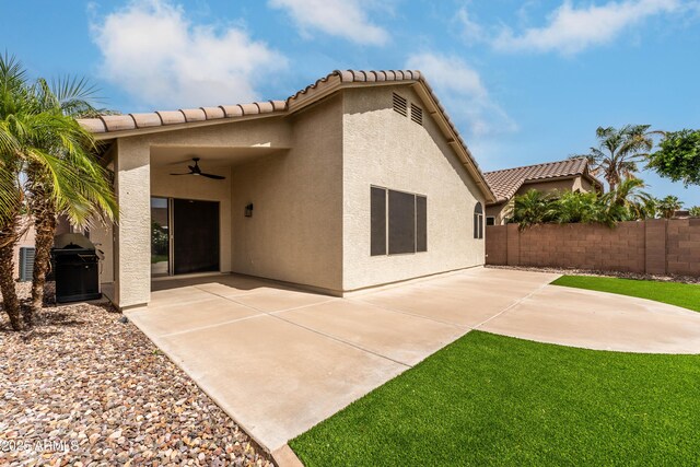 16424 S 46th Way, Phoenix, AZ 85048 - rear view of property featuring a ceiling fan, stucco siding, a patio area, and a tiled roof
