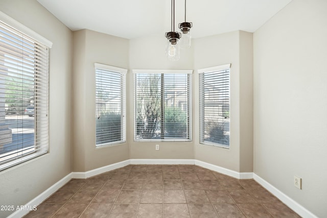 16424 S 46th Way, Phoenix, AZ 85048 - empty room featuring healthy amount of natural light, tile patterned floors, and baseboards