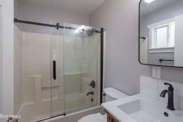 281 S 31st Dr, Show Low, AZ 85901 - bathroom featuring toilet, vanity, and combined bath / shower with glass door
