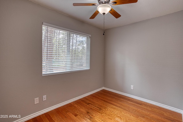 281 S 31st Dr, Show Low, AZ 85901 - empty room with light wood-style flooring, baseboards, and ceiling fan