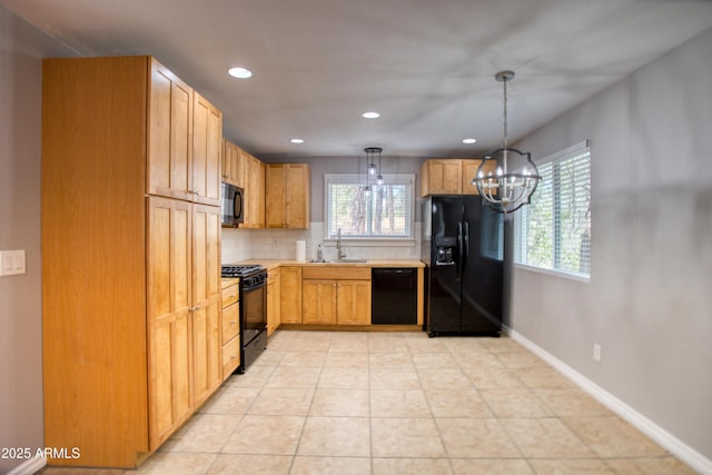 281 S 31st Dr, Show Low, AZ 85901 - kitchen featuring black appliances, a chandelier, healthy amount of natural light, backsplash, and recessed lighting